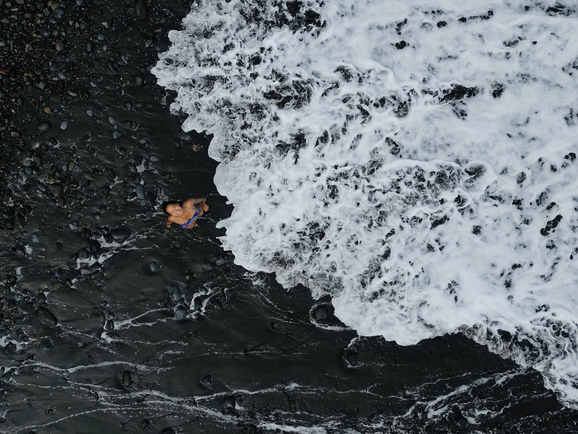 madeira seixal beach drone shot bikini model